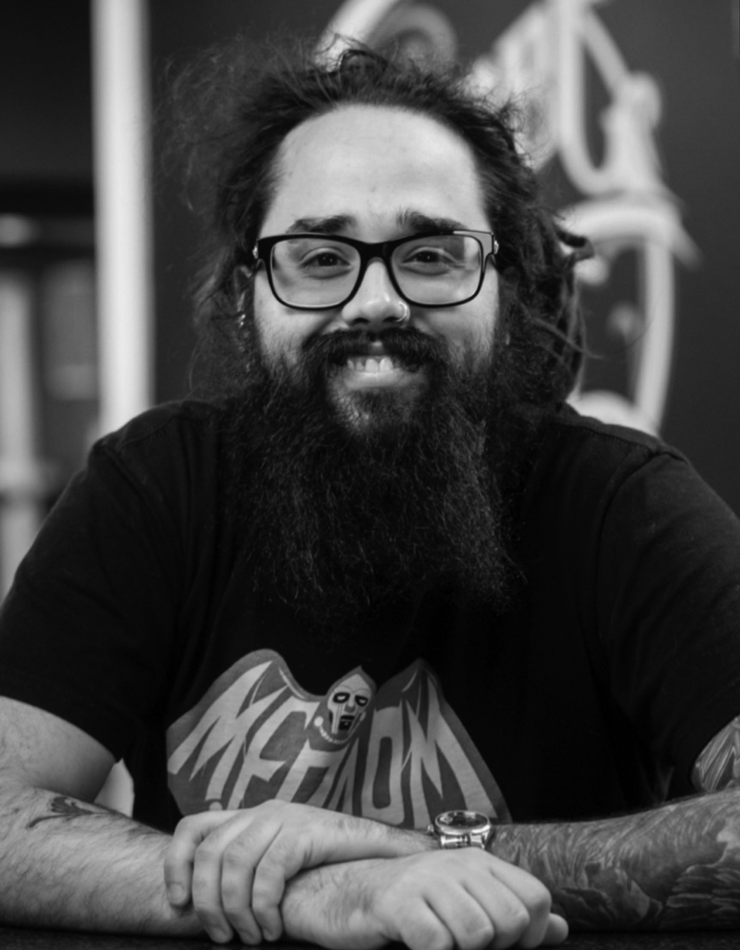 Tattoo artist with a beard